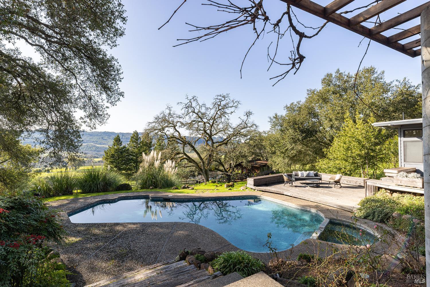 5815 Bennett Valley Road Santa Rosa, CA 95404 - Photo 14 of 50 a view of a swimming pool with a patio
