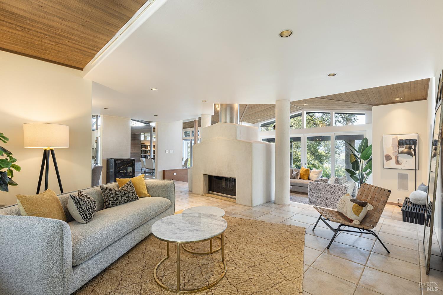 5815 Bennett Valley Road Santa Rosa, CA 95404 - Photo 26 of 50 a living room with furniture and a fireplace