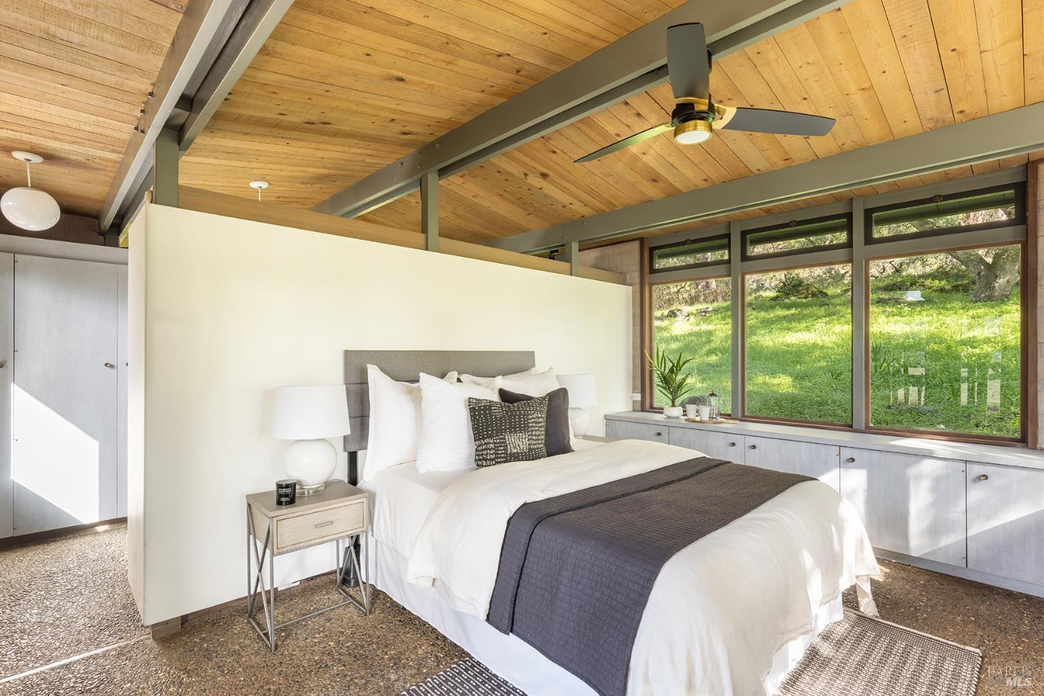 5815 Bennett Valley Road Santa Rosa, CA 95404 - Photo 33 of 50 a bedroom with a large bed and a large window