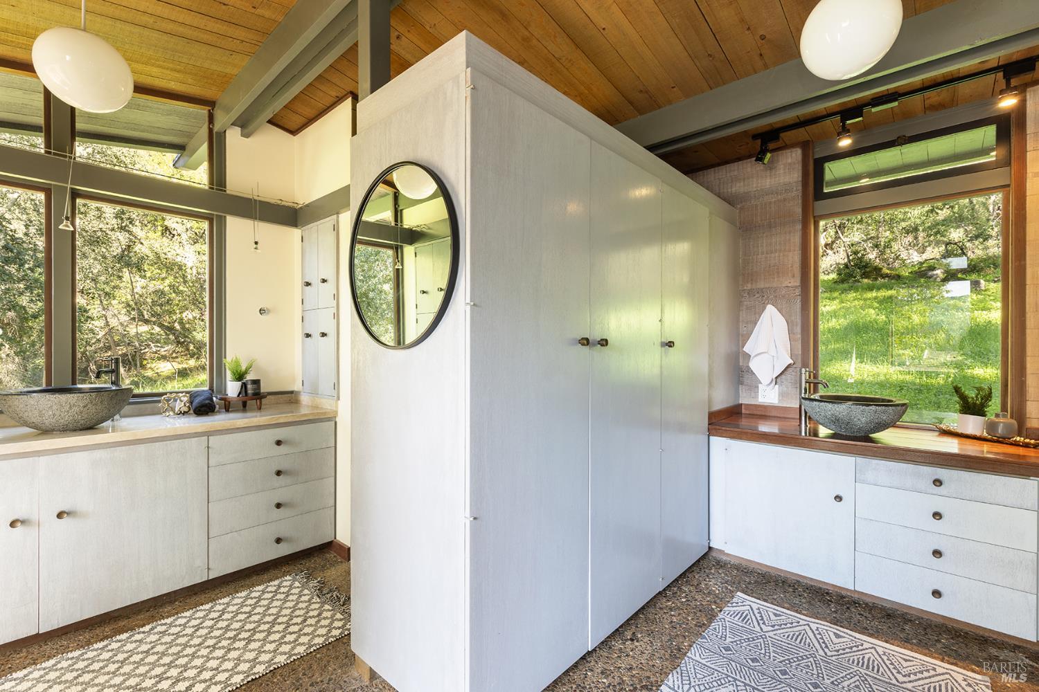 5815 Bennett Valley Road Santa Rosa, CA 95404 - Photo 34 of 50 a bathroom with a sink a mirror and a window