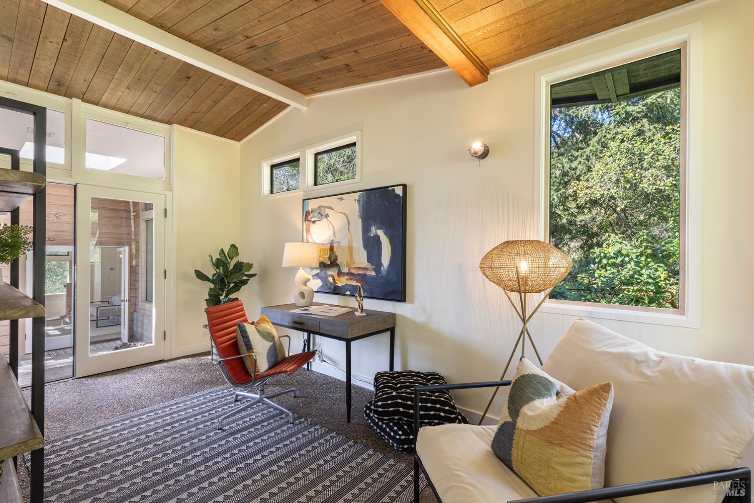 5815 Bennett Valley Road Santa Rosa, CA 95404 - Photo 37 of 50 a living room with furniture and a chandelier