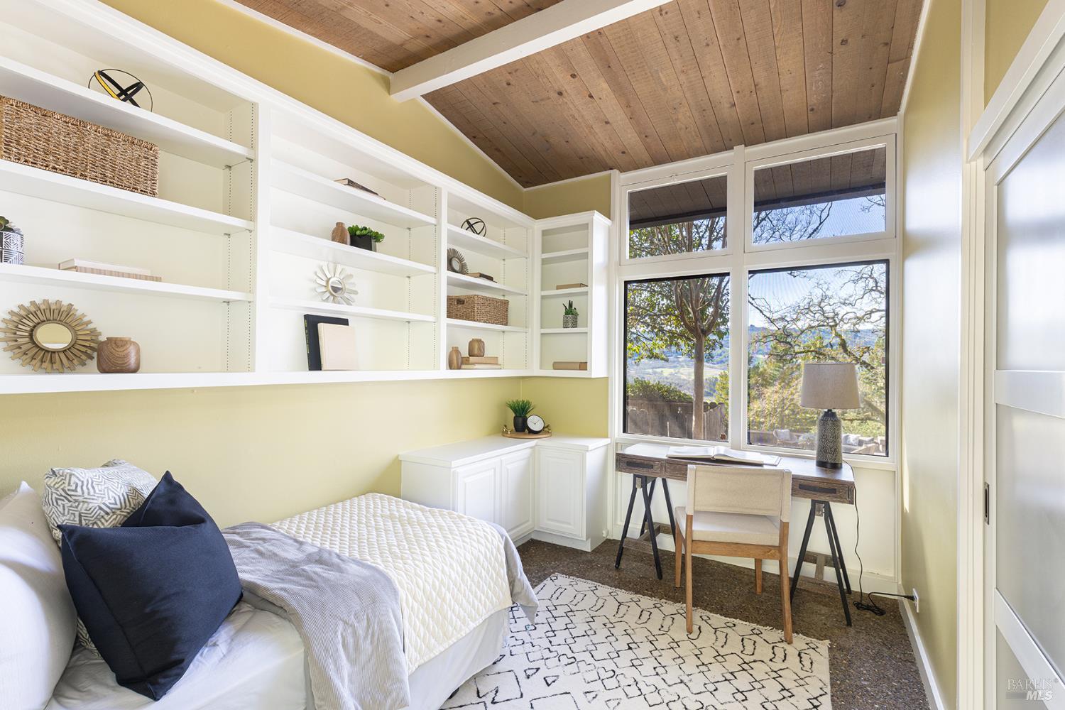 5815 Bennett Valley Road Santa Rosa, CA 95404 - Photo 38 of 50 a bed room with a bed and a chair