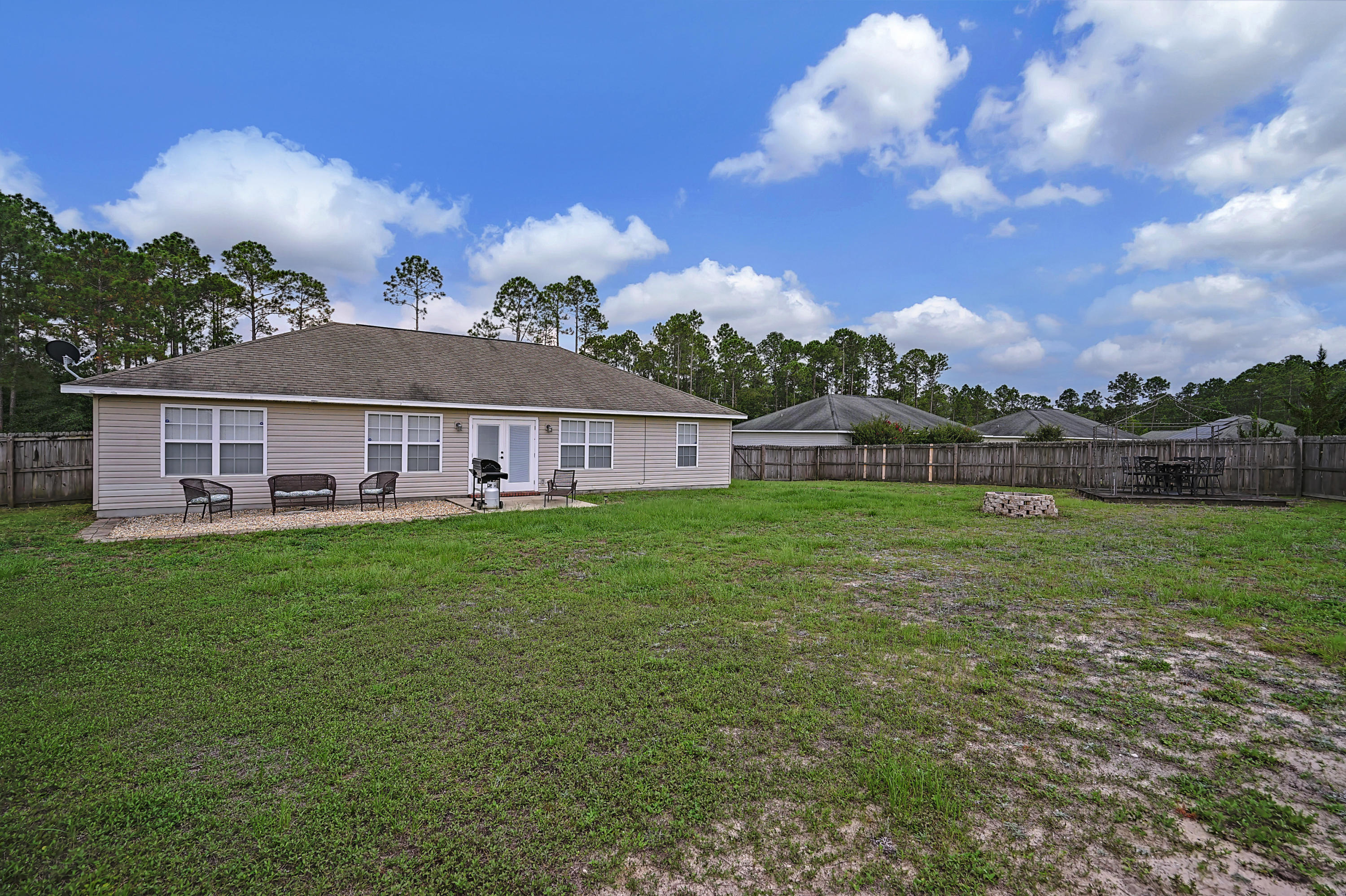 5145 Eagle Way Crestview, FL 32539 - Photo 14 of 15 a view of a house with a big yard