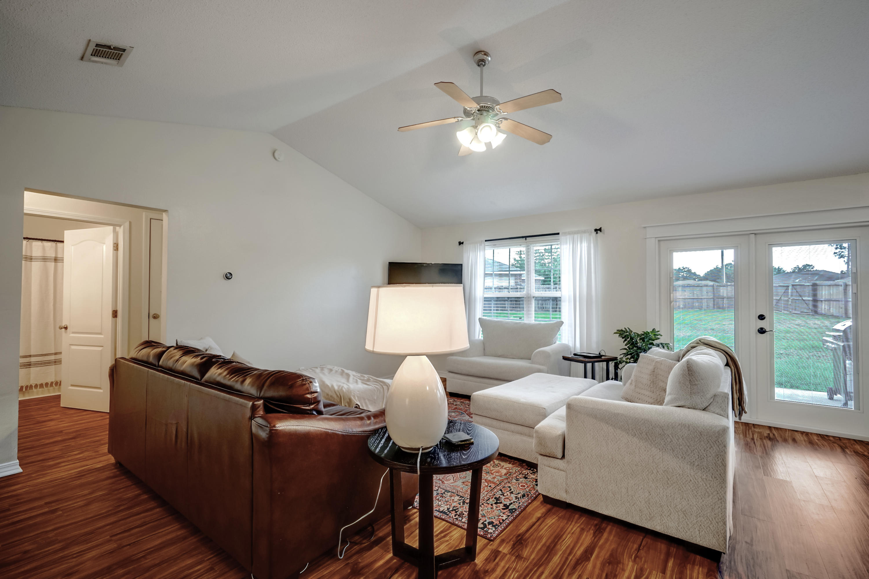 5145 Eagle Way Crestview, FL 32539 - Photo 3 of 15 a living room with furniture and wooden floor