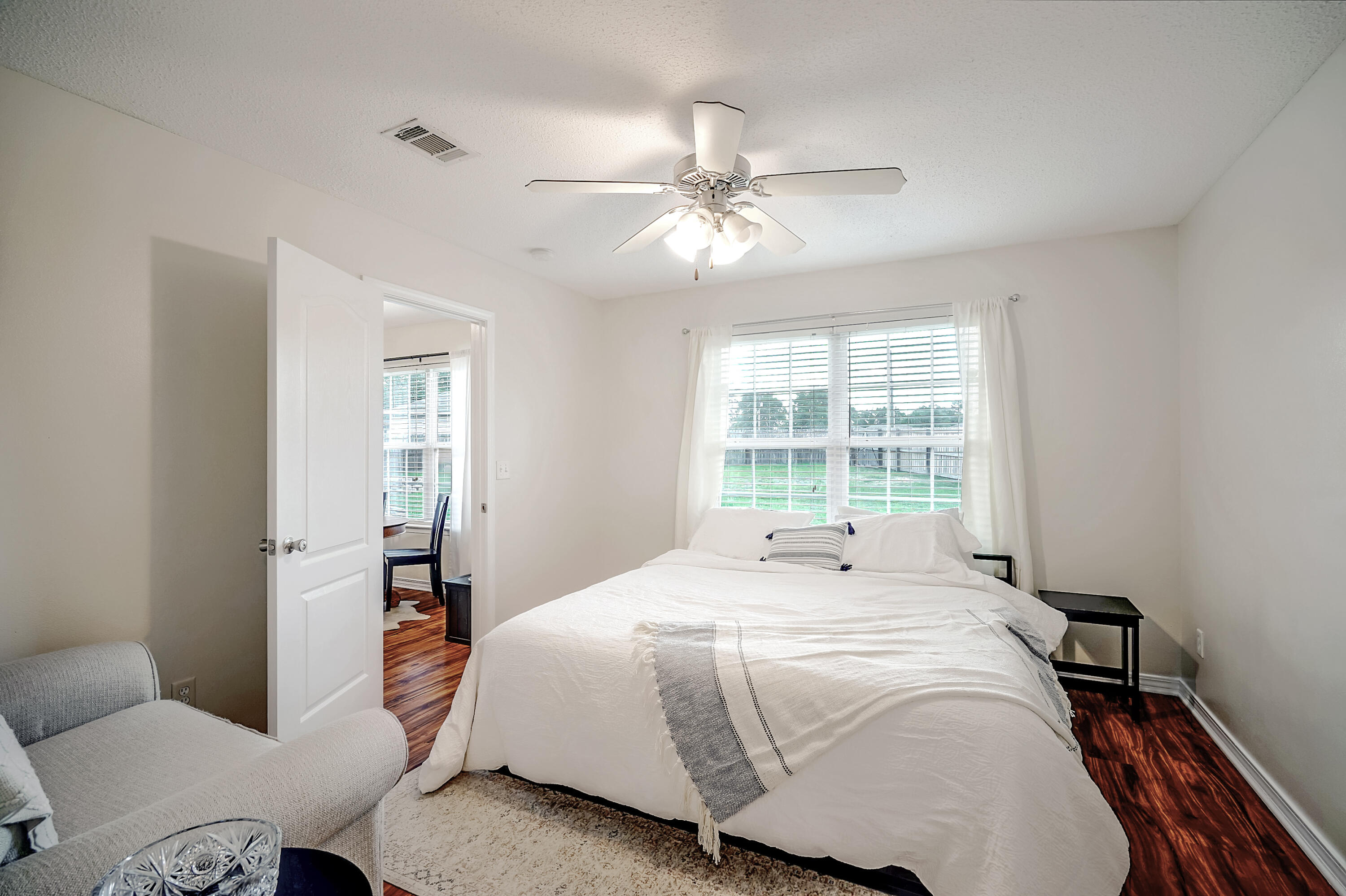 5145 Eagle Way Crestview, FL 32539 - Photo 8 of 15 a bedroom with a bed and a window