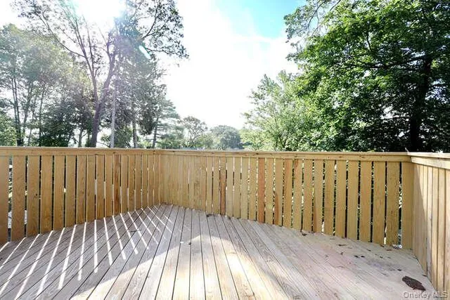 a view of outdoor space with wooden deck