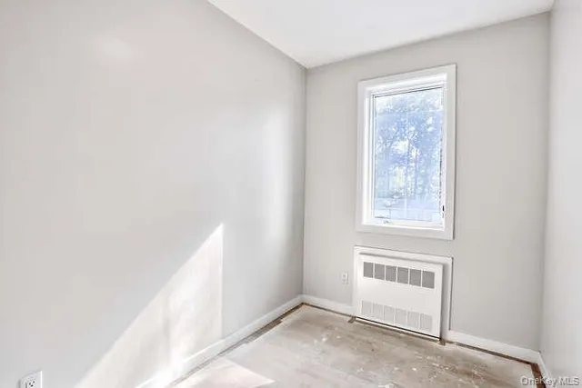 a view of a small space with a window