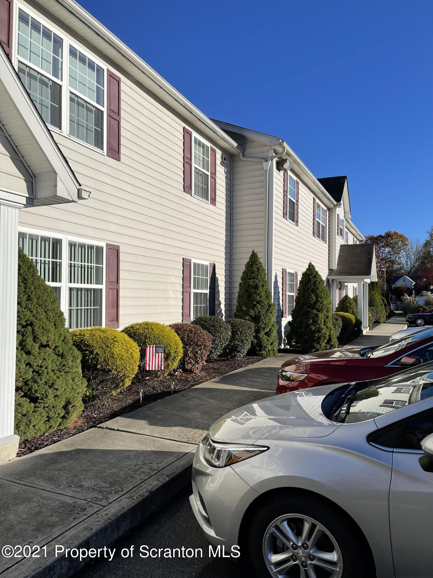 253 Elm Street Moosic, PA 18507 - Photo 3 of 15 a front view of a house with parking space