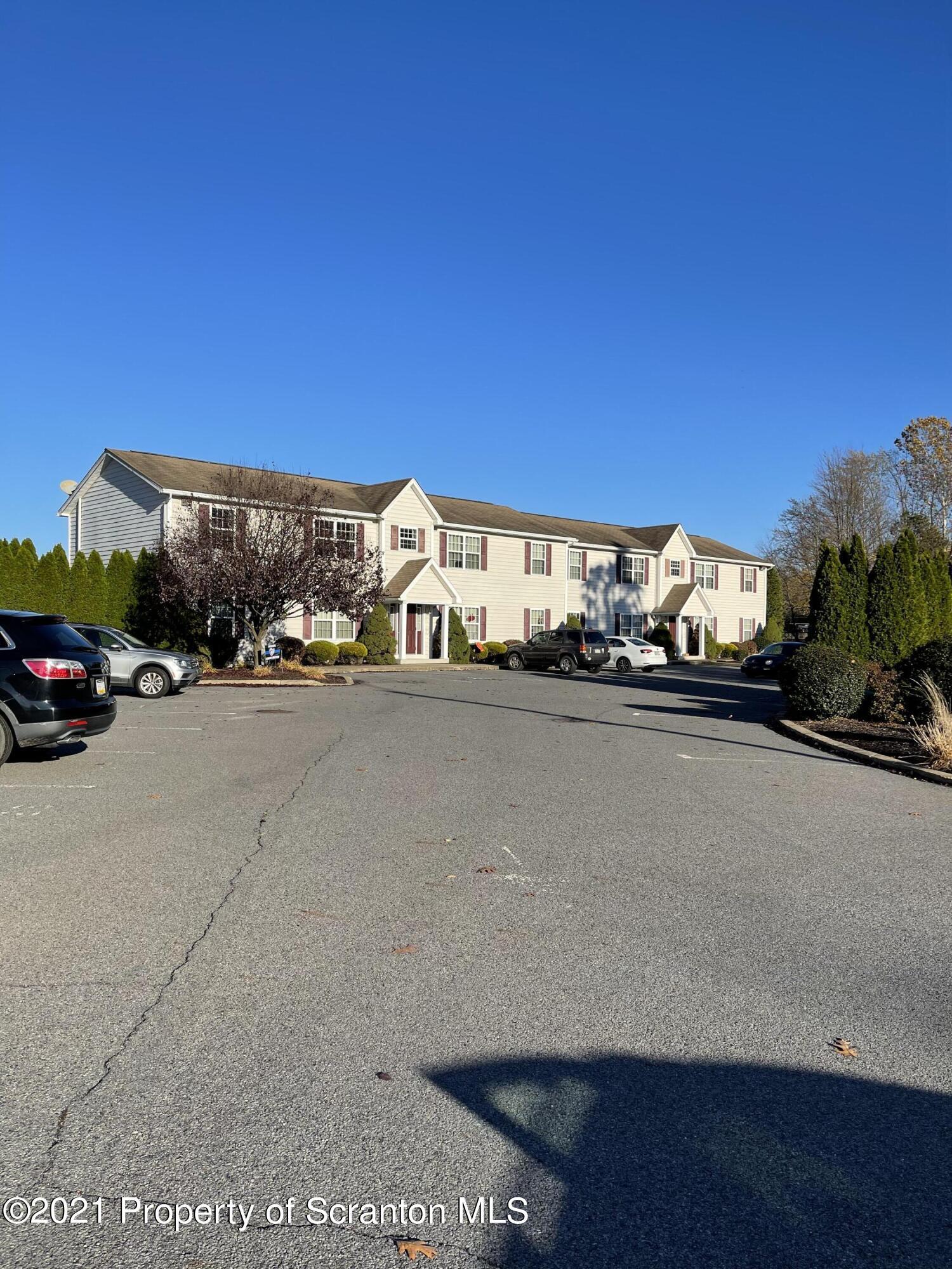 253 Elm Street Moosic, PA 18507 - Photo 4 of 15 a view of street with cars