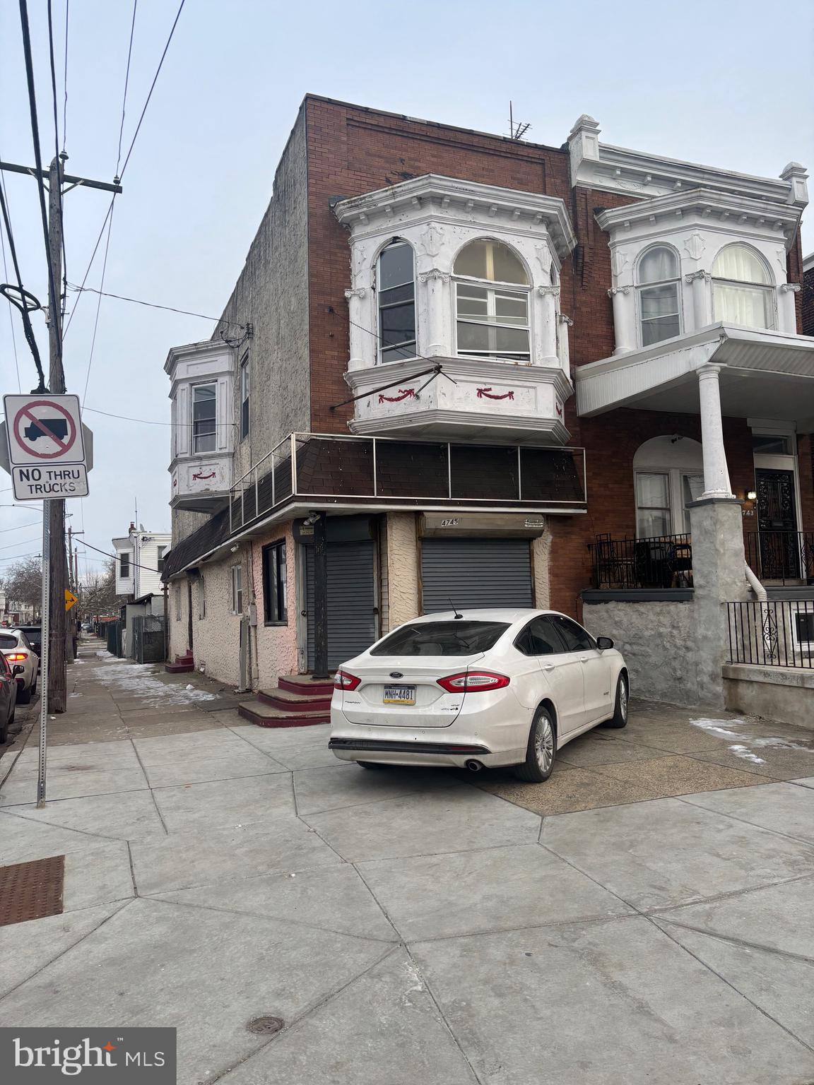 4745 A Street Philadelphia, PA 19120 - Photo 1 of 13 a car parked in front of a building