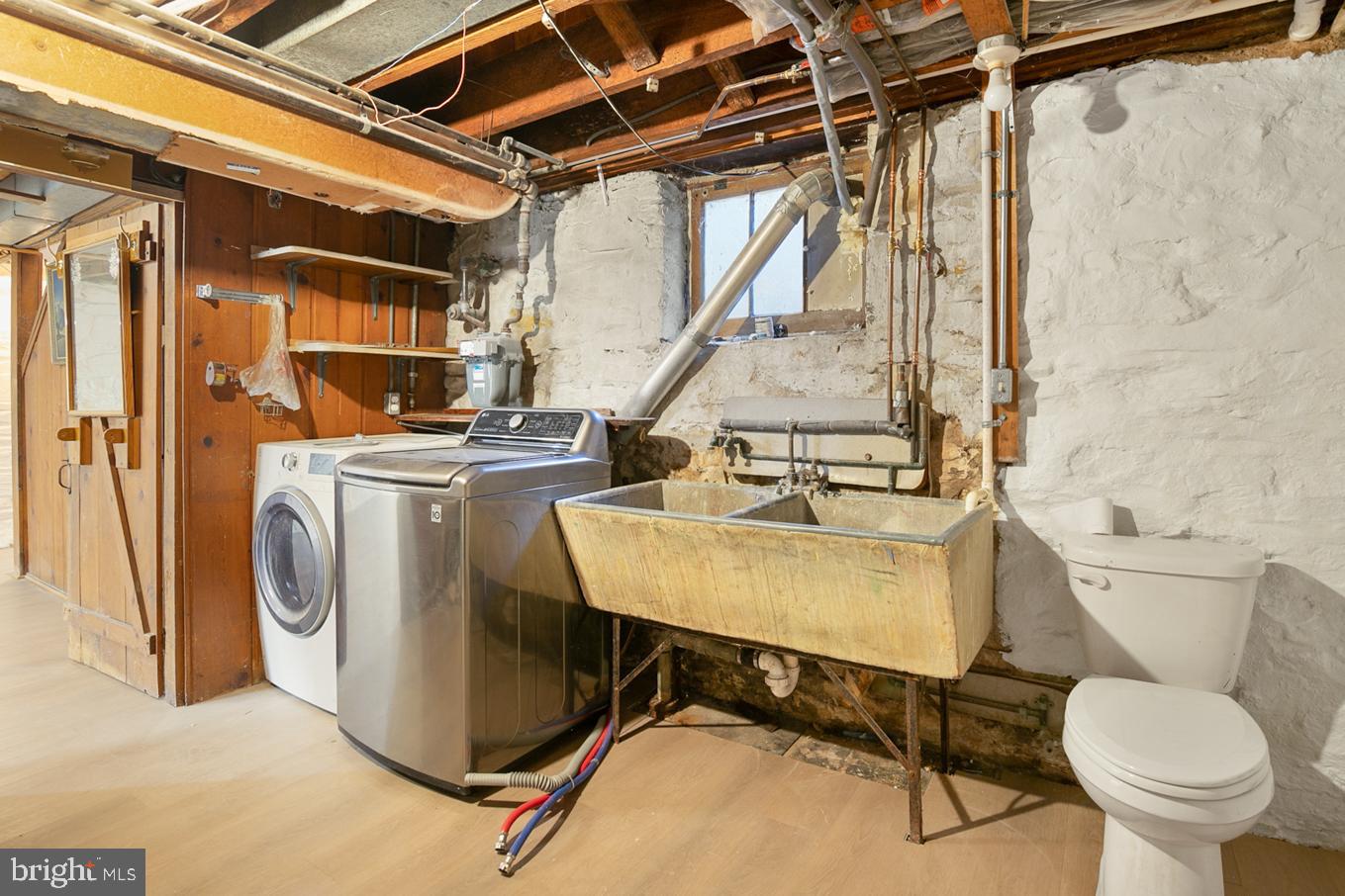 4107 Westview Road Baltimore, MD 21218 - Photo 19 of 27 Laundry w/ Basement flush