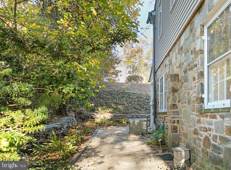 4107 Westview Road Baltimore, MD 21218 - Photo 22 of 27 North Side w Hostas & Perrenials