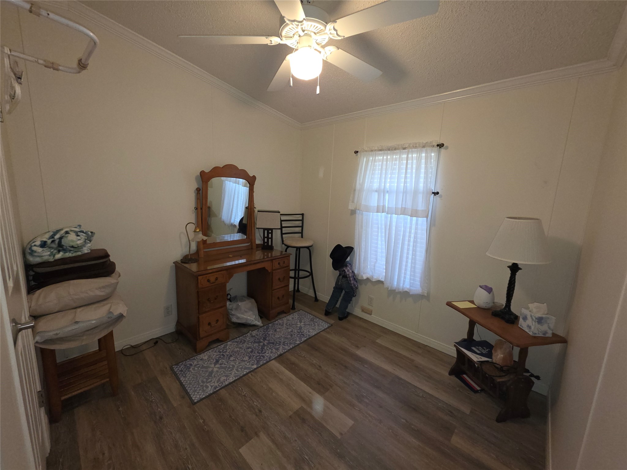 70 Montego Way Point Blank, TX 77364 - Photo 13 of 41 a view of a workspace with furniture and a window