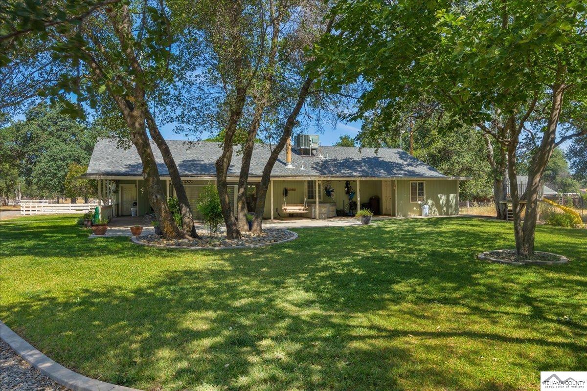 18887 Ridge Road Red Bluff, CA 96080 - Photo 44 of 48 a front view of a house with a garden