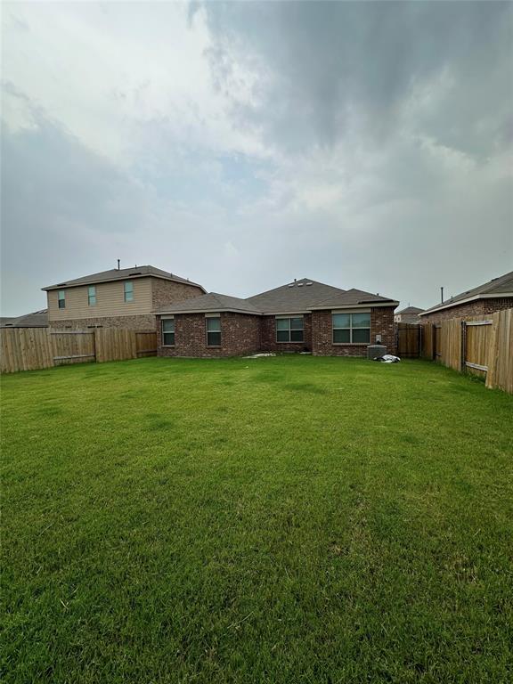 3122 Zapta Road Forney, TX 75126 - Photo 2 of 8 a view of a house with a big yard and large trees