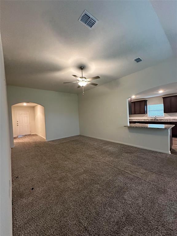 3122 Zapta Road Forney, TX 75126 - Photo 5 of 8 a view of a livingroom with a staircase