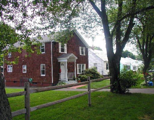 1666 Stratfield Road Fairfield, CT 06825 - Photo 1 of 1 a front view of a house with garden