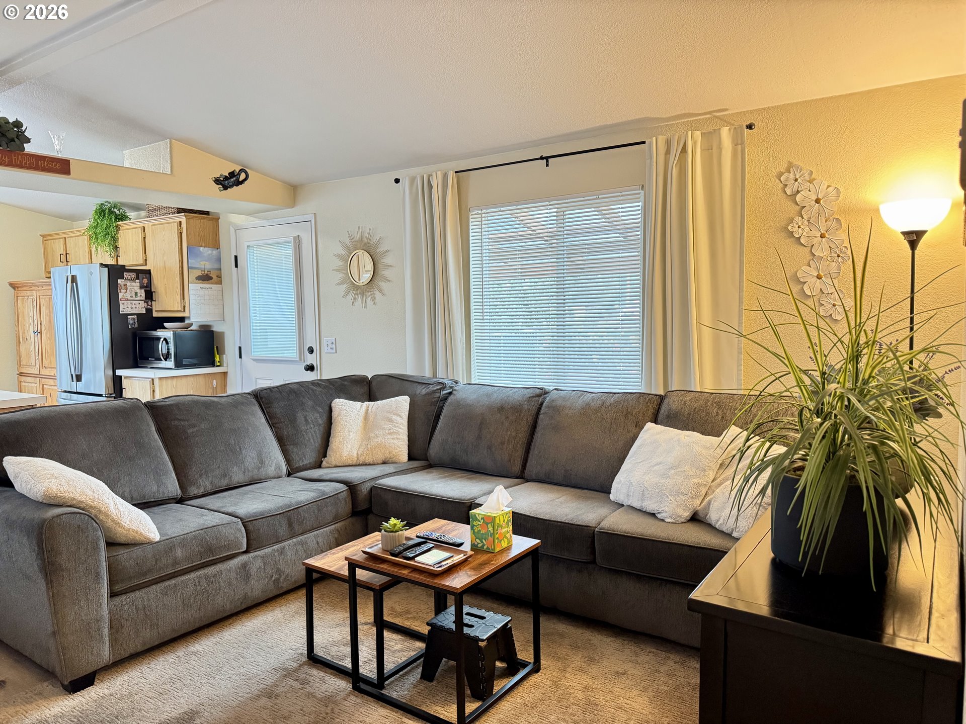 3760 Highway 101, Unit 1 Florence, OR 97439 - Photo 14 of 32 a living room with furniture and a large window