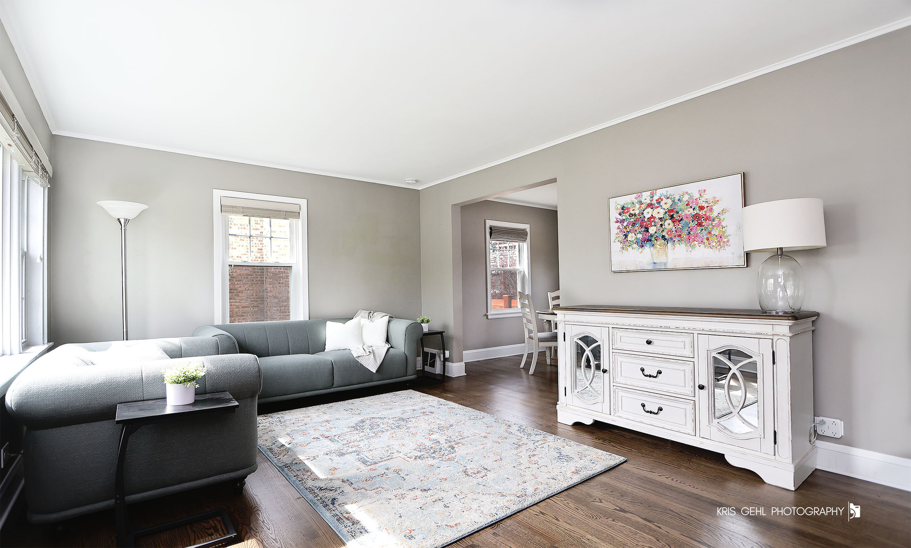 956 Spring Road Elmhurst, IL 60126 - Photo 2 of 26 a living room with furniture and wooden floor