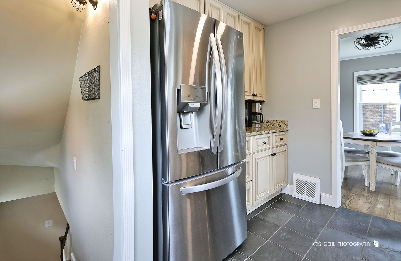 956 Spring Road Elmhurst, IL 60126 - Photo 8 of 26 a kitchen with white cabinets and refrigerator