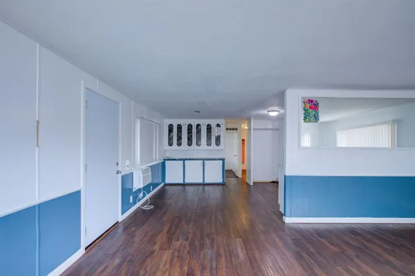 a view of livingroom with furniture and wooden floor