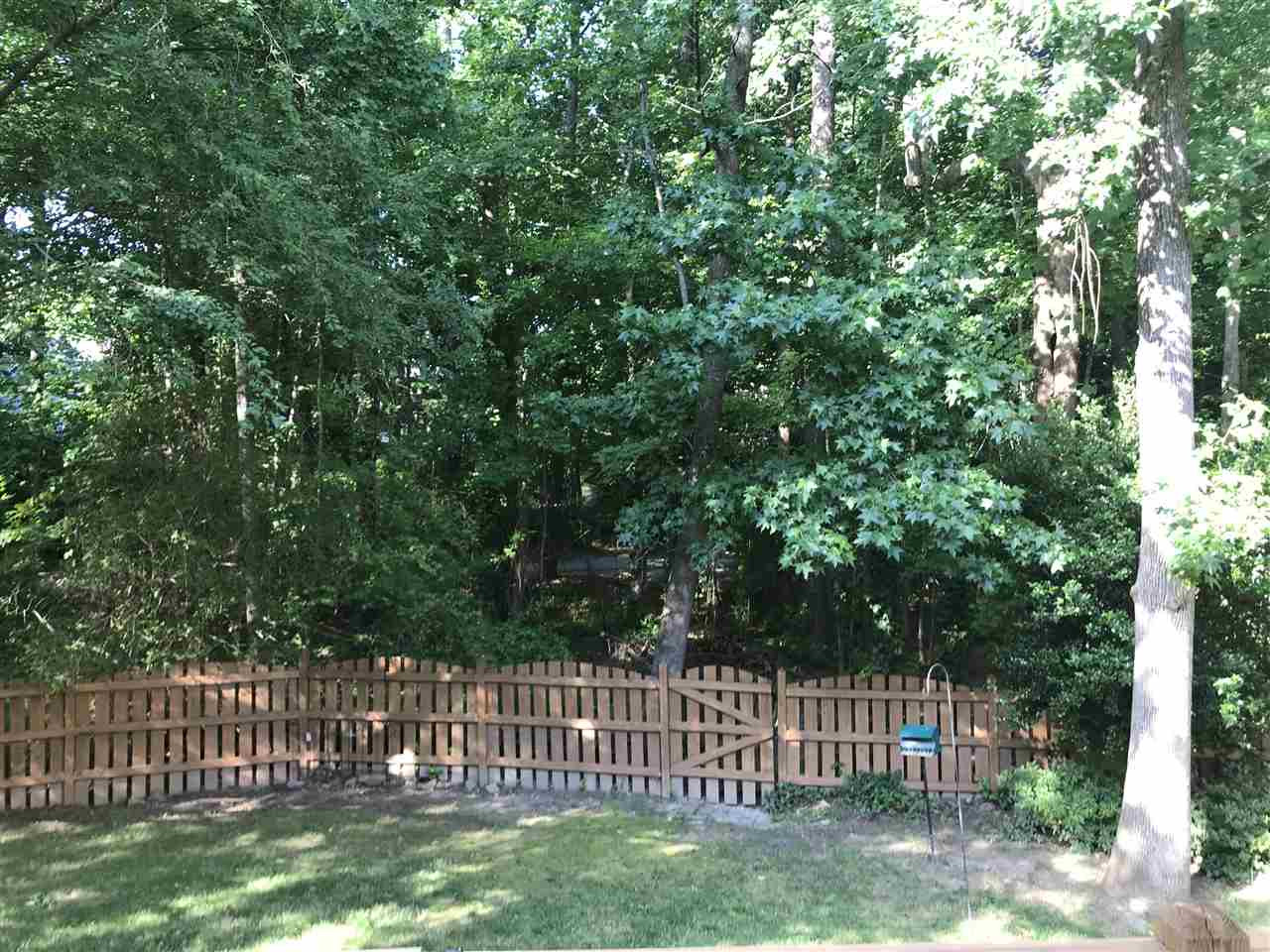 2900 Dahlgreen Road Raleigh, NC 27615 - Photo 20 of 25 Lovely backyard. Open the gate and cross the bridge--just steps to the greenway trails. Also 5 minutes drive to Durant Nature Park. Bridge over creek to convey in "as is" condition. Back Yard