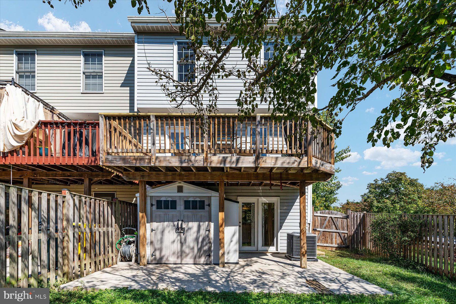 2470 Warm Spring Way Odenton, MD 21113 - Photo 32 of 35 Rear Yard with Concrete Patio & Shed