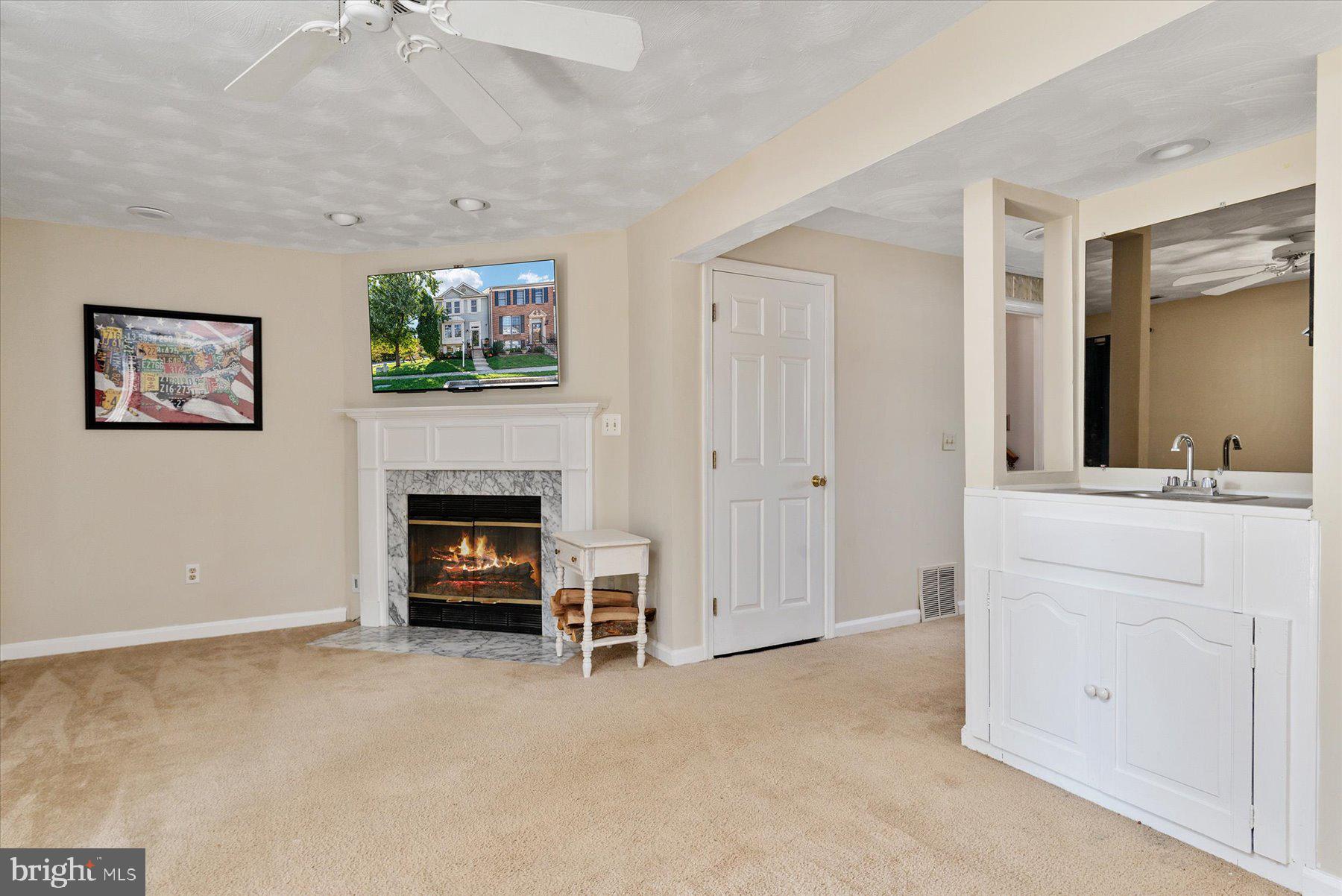 2470 Warm Spring Way Odenton, MD 21113 - Photo 5 of 35 Lower-Level Family Room with Fireplace!