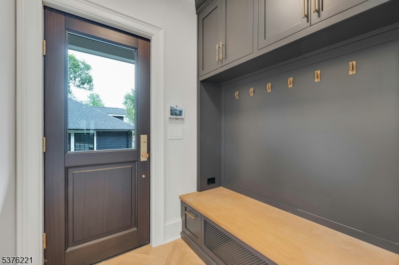 82 Watchung Avenue Montclair, NJ 07043 - Photo 20 of 48 a room with a wooden floor and a window