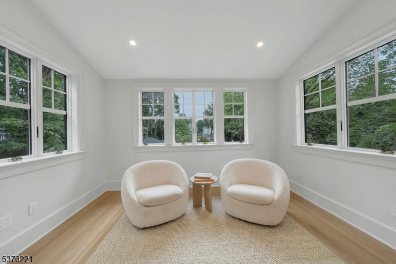 82 Watchung Avenue Montclair, NJ 07043 - Photo 27 of 48 a living room with furniture and a large window