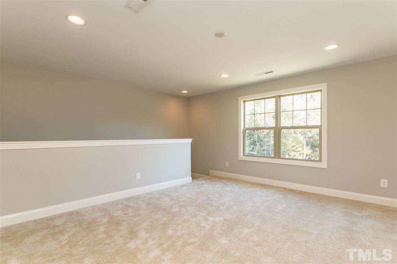 1505 Chestnut Falls Road Wendell, NC 27591 - Photo 20 of 25 The loft opens into a 3rd full bedroom great for teen suite or visiting guest.