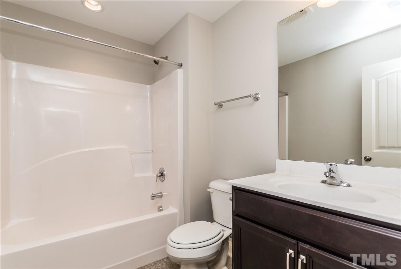 1505 Chestnut Falls Road Wendell, NC 27591 - Photo 21 of 25 This 3rd bathroom is located on the second floor between the 3rd bedroom and loft.
