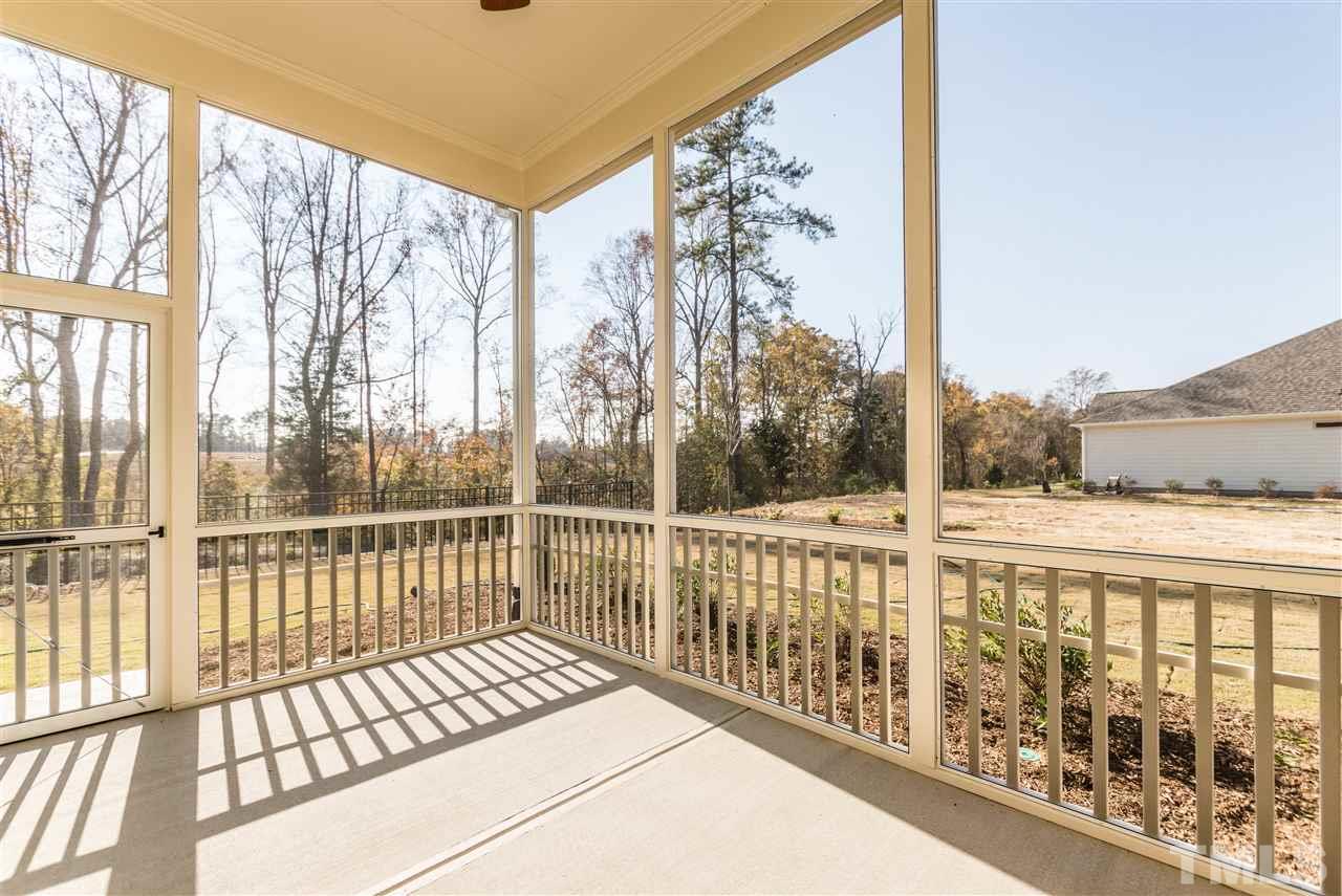 1505 Chestnut Falls Road Wendell, NC 27591 - Photo 23 of 25 Great views anytime and an extra space for relaxing and entertaining when you want to be outside.