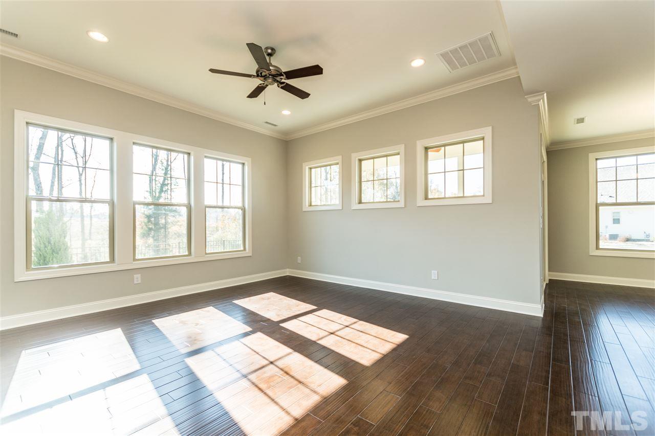 1505 Chestnut Falls Road Wendell, NC 27591 - Photo 5 of 25 TWO walls of windows provide an abundant amount of natural light