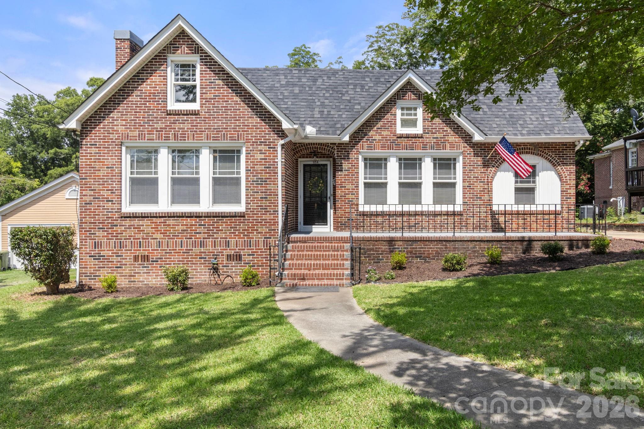 108 Reedy Street Chester, SC 29706 - Photo 1 of 42 a front view of a house with a yard
