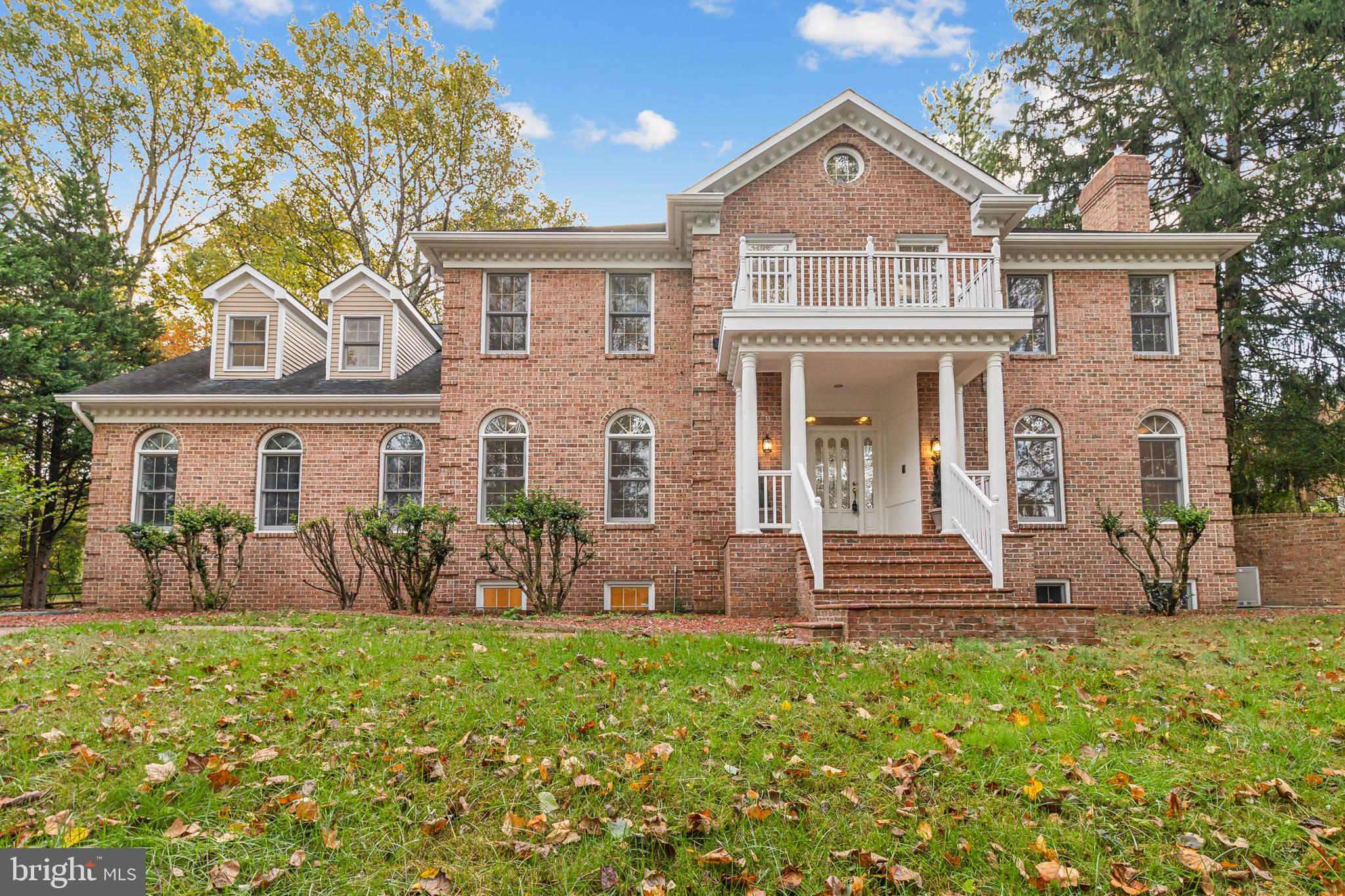 2527 Hunter Mill Road Oakton, VA 22124 - Photo 1 of 85 Elegant brick home with lush surroundings.