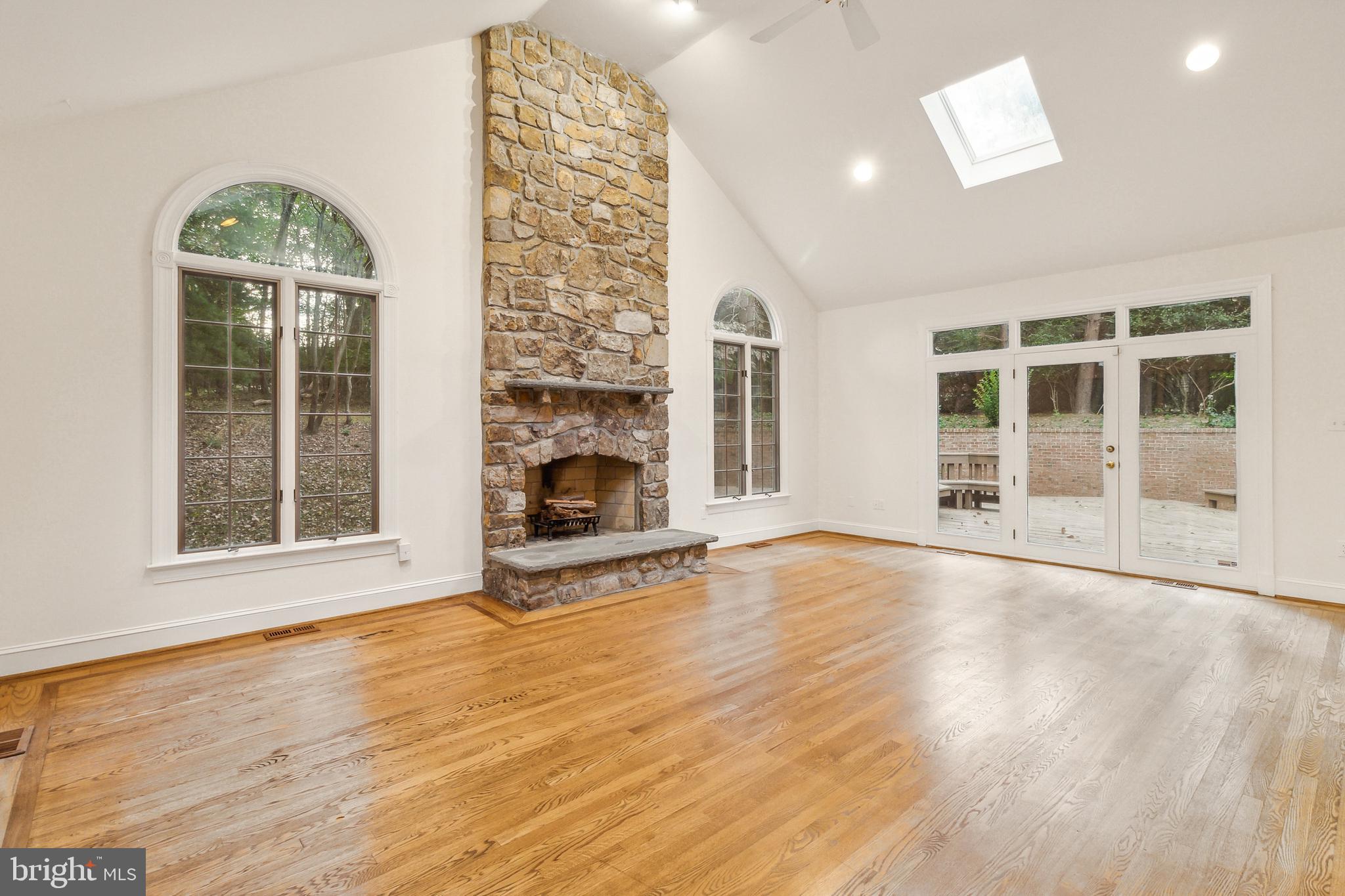 2527 Hunter Mill Road Oakton, VA 22124 - Photo 27 of 85 Spacious living area with stone fireplace.