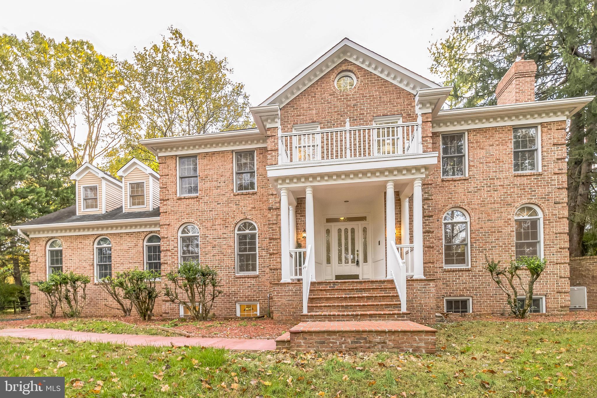 2527 Hunter Mill Road Oakton, VA 22124 - Photo 3 of 85 Elegant brick home with grand entrance.