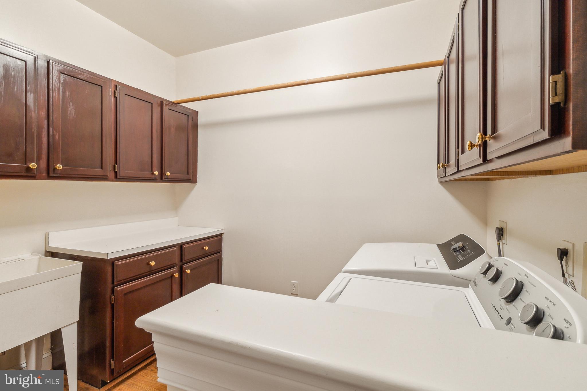 2527 Hunter Mill Road Oakton, VA 22124 - Photo 32 of 85 Bright and functional laundry space.