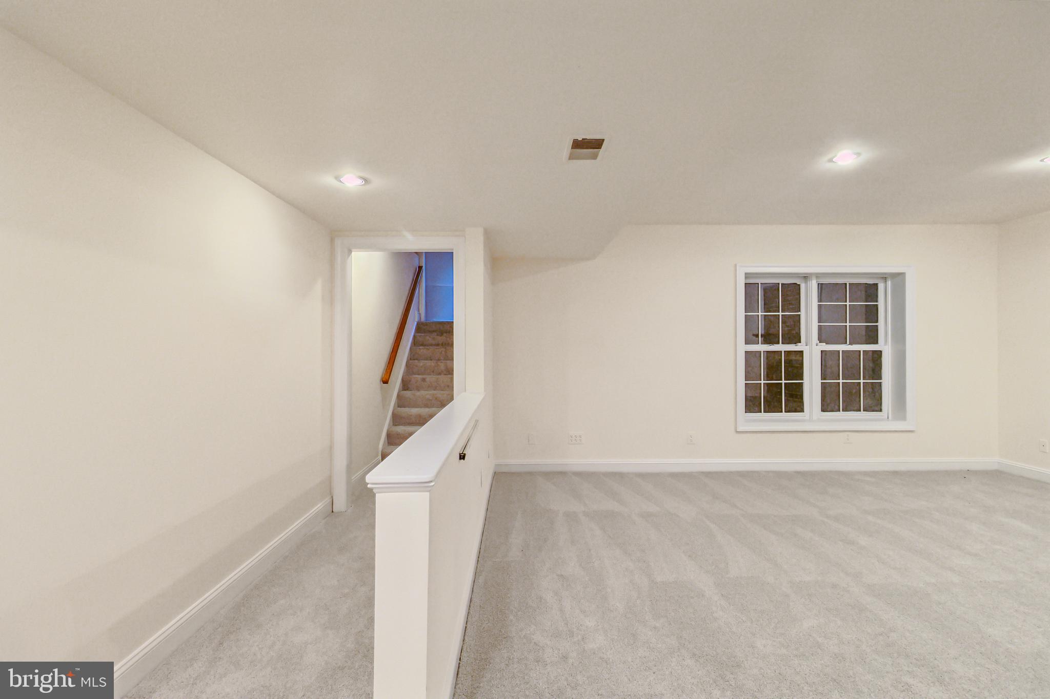 2527 Hunter Mill Road Oakton, VA 22124 - Photo 68 of 85 Spacious, inviting basement retreat.