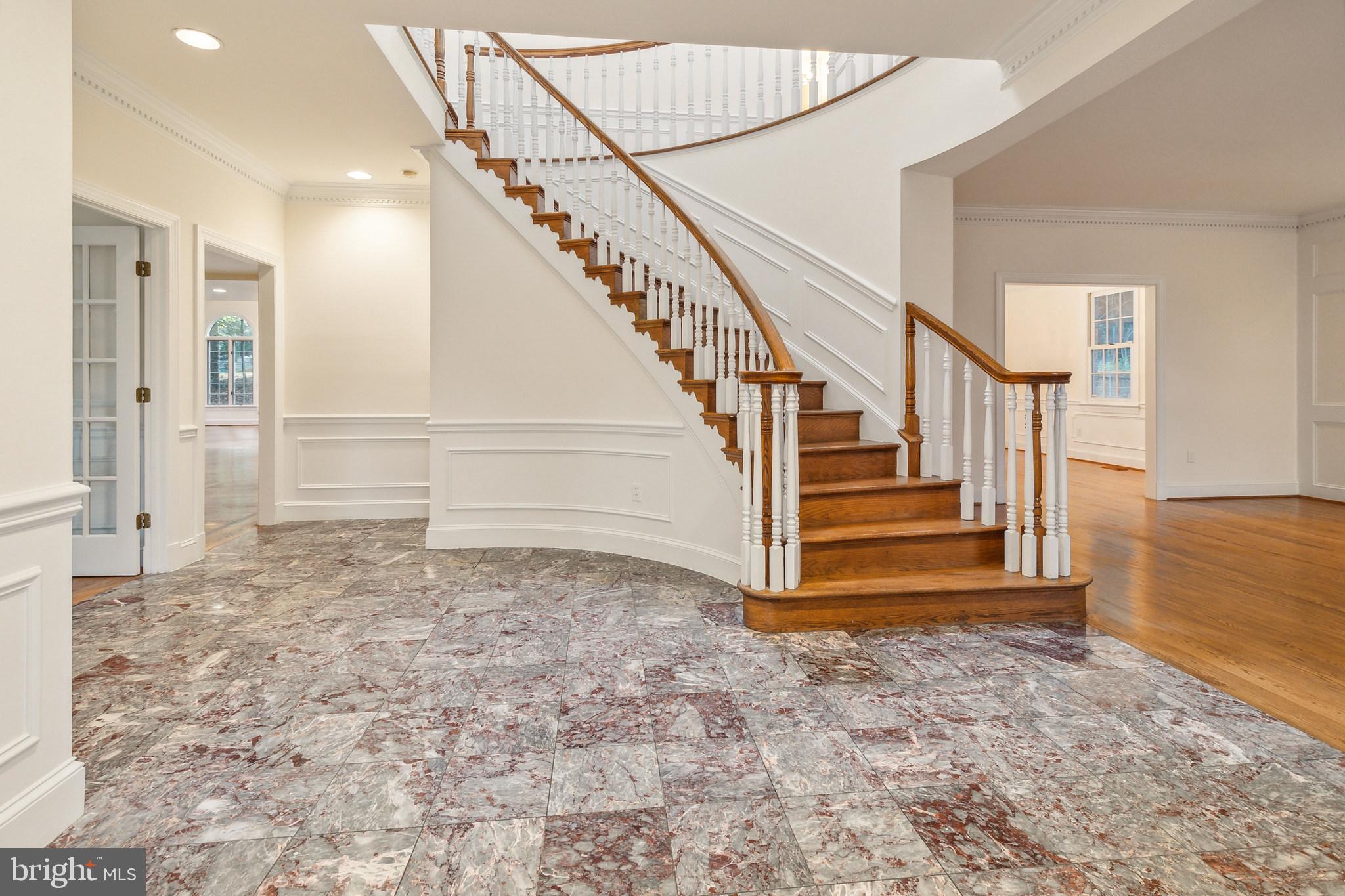 2527 Hunter Mill Road Oakton, VA 22124 - Photo 10 of 85 Elegant foyer with grand staircase.