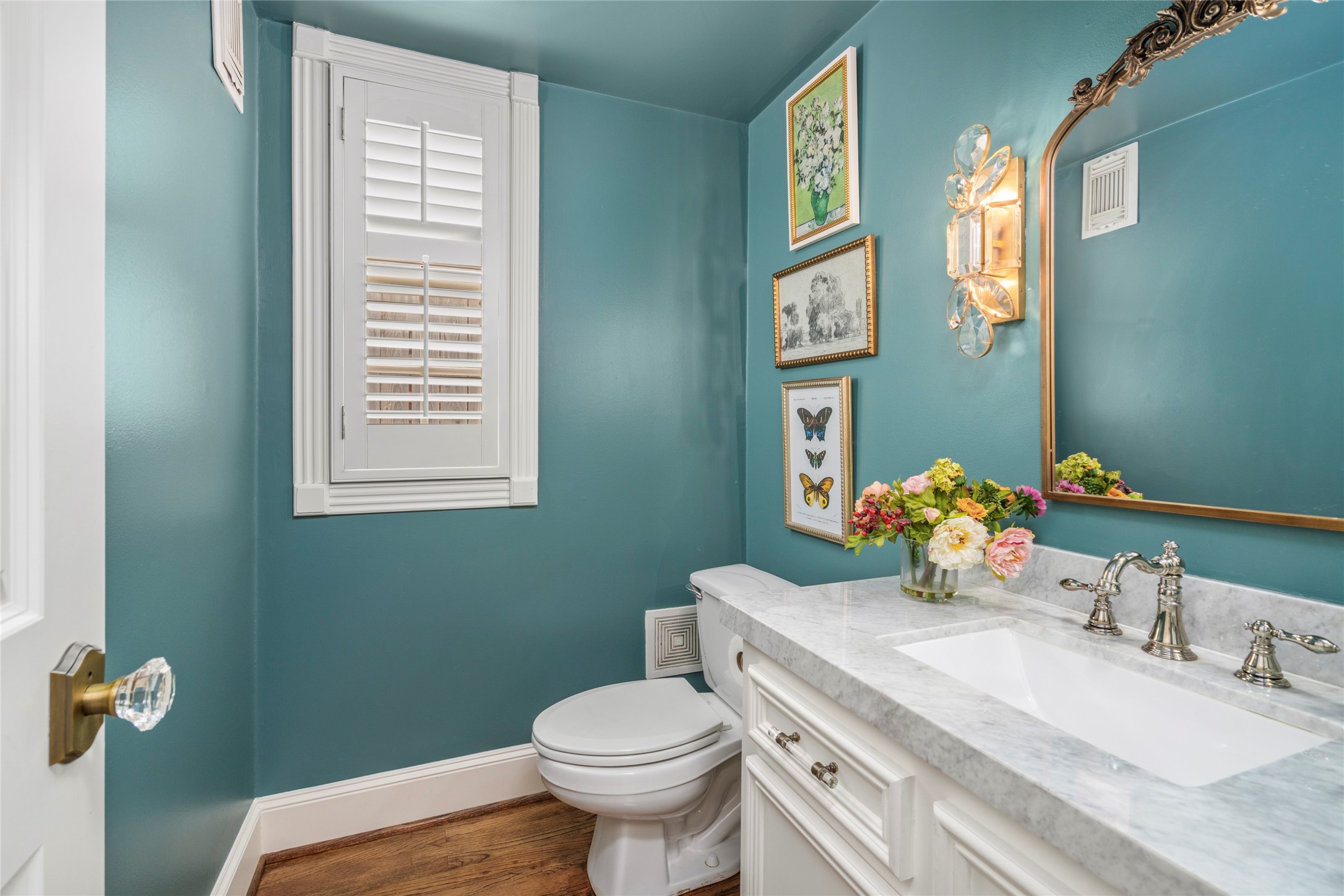 4220 Riley Street West University Place, TX 77005 - Photo 20 of 35 The powder bathroom is nicely nestled apart from the main living and dining areas. Love this paint color!
