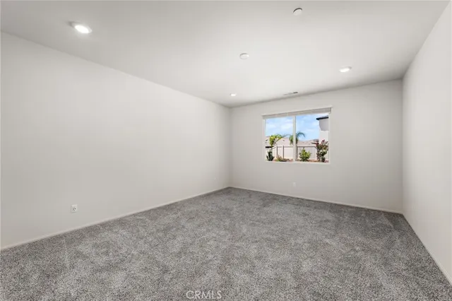 an empty room with an entryway