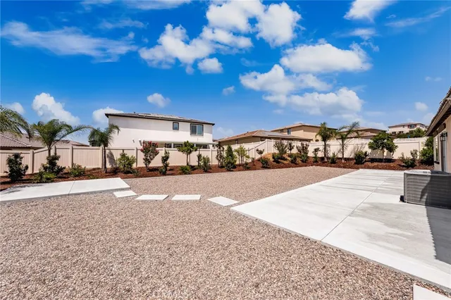 a view of a pathway of a pathway both side of house