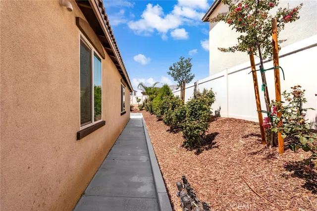 a view of a pathway both side of a building