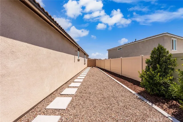 a view of a balcony with wooden floor
