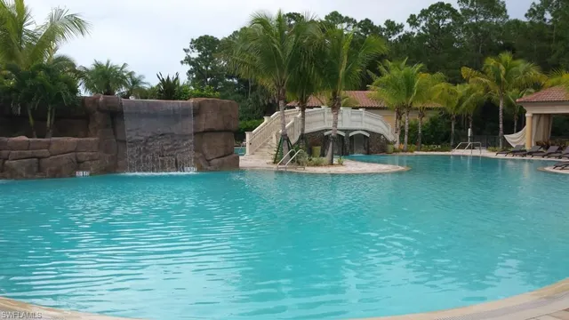 a view of a swimming pool with a garden