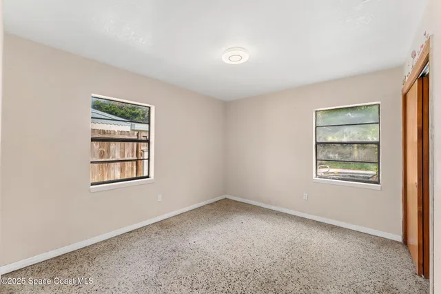 an empty room with a window