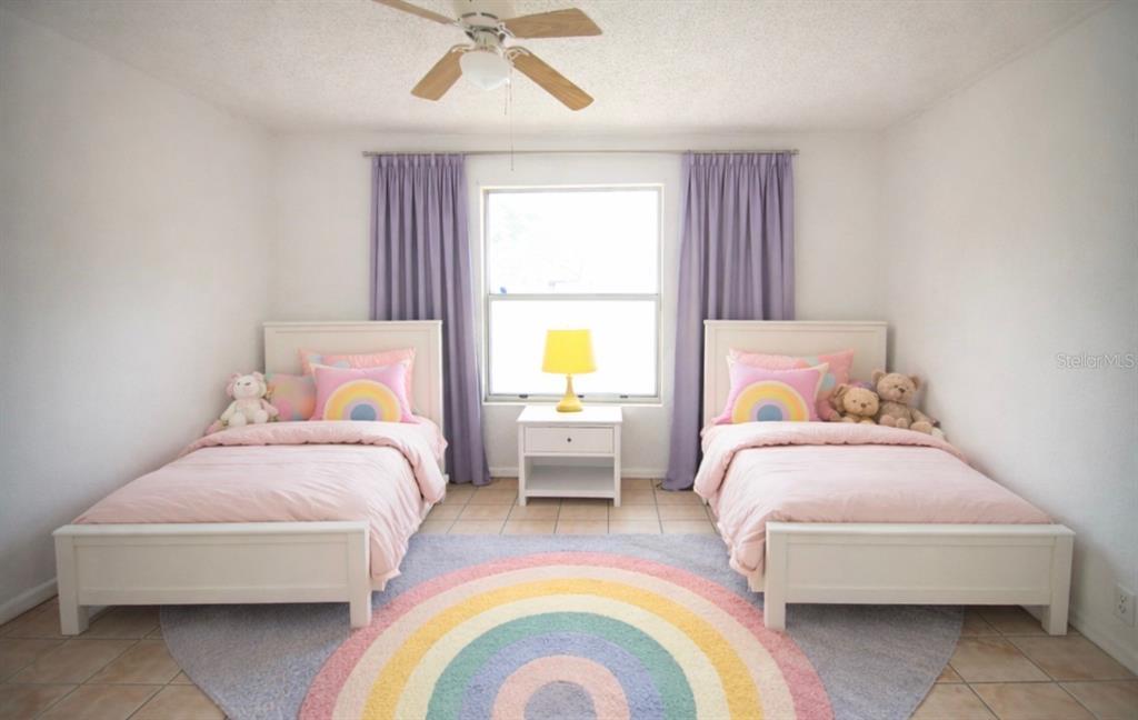 606 Water Road Ocala, FL 34472 - Photo 14 of 34 a bedroom with bed and window