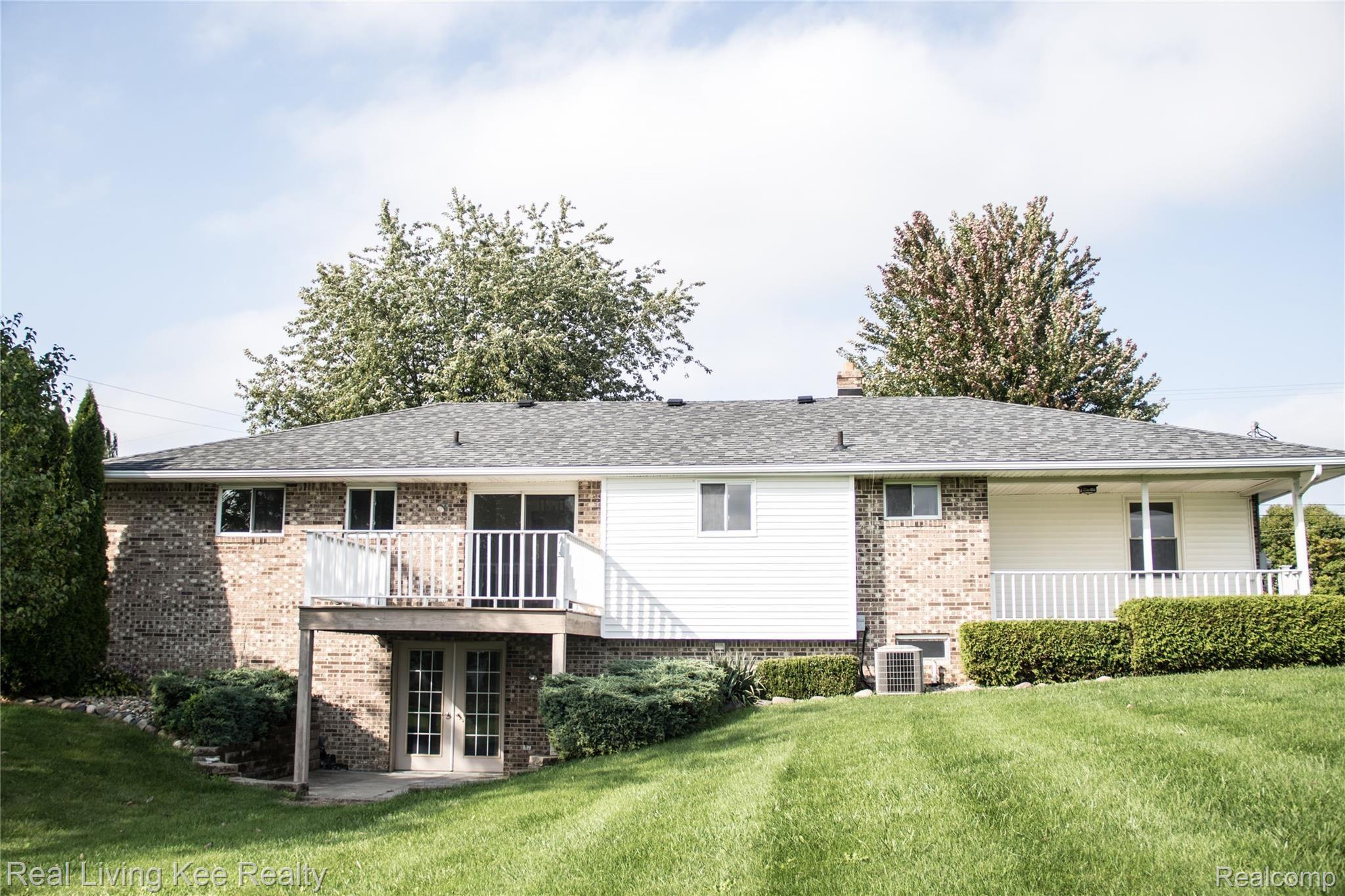 16475 Almont Road Allenton, MI 48002 - Photo 6 of 43 Back of home 3.jpg
